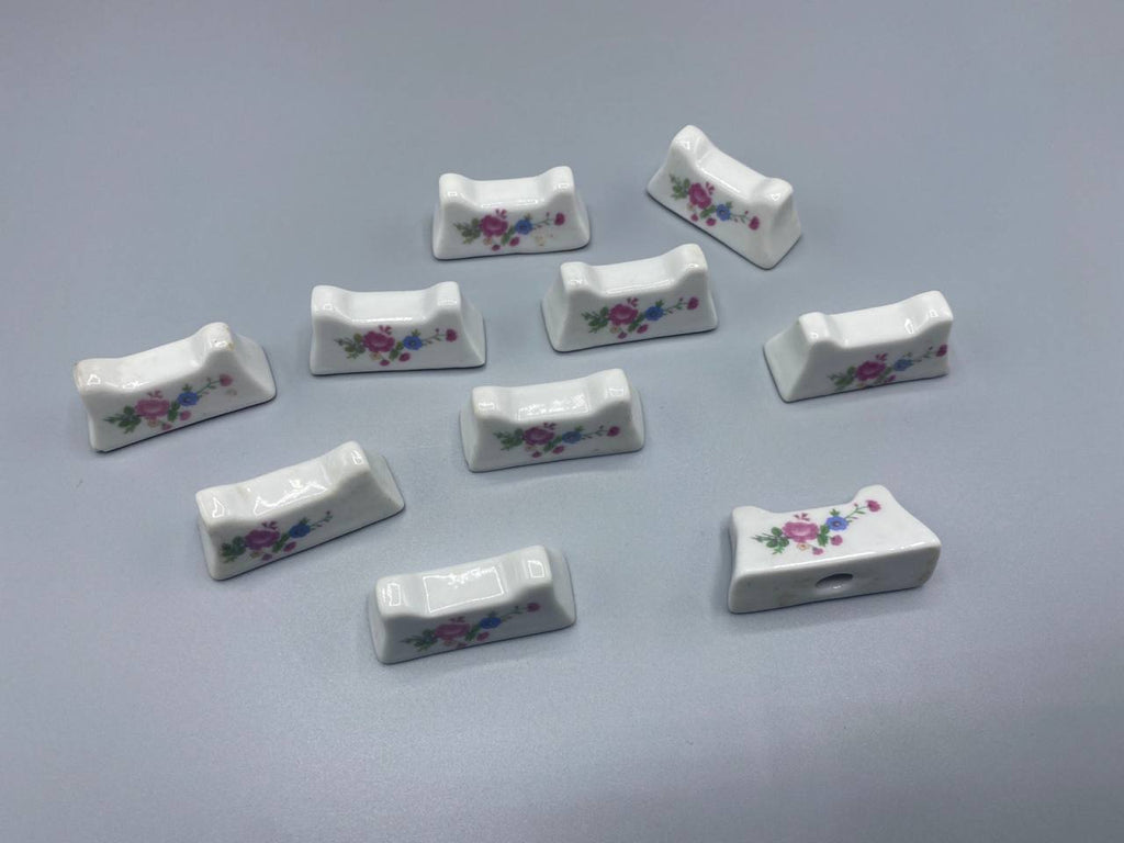 10 repose-couteaux porcelaine blanche – Bouquet de roses polychrome