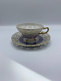Tasse et soucoupe ajourée porcelaine – Bandeau bleu lavande et or – Bohême début XXe