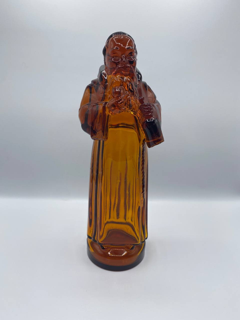 Bouteille figurine en verre ambré moulé – Sage oriental barbu – Lejay-Lagoute Dijon