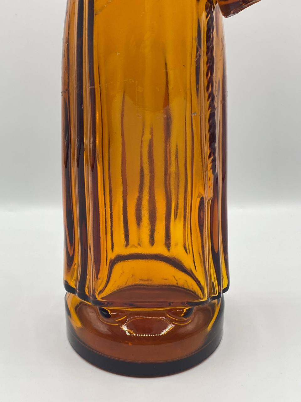 Bouteille figurine en verre ambré moulé – Sage oriental barbu – Lejay-Lagoute Dijon