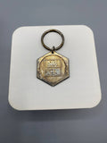 Porte-clés publicitaire Crédit Lyonnais – Siège Central – Médaillon hexagonal