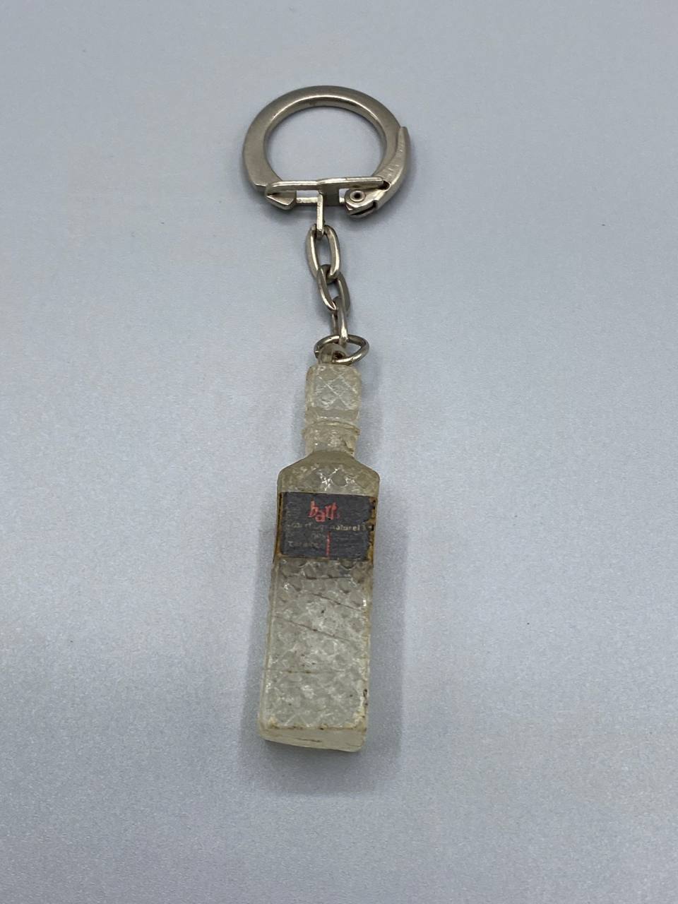 Porte-clés publicitaire Bart's Rum – Bouteille miniature en résine