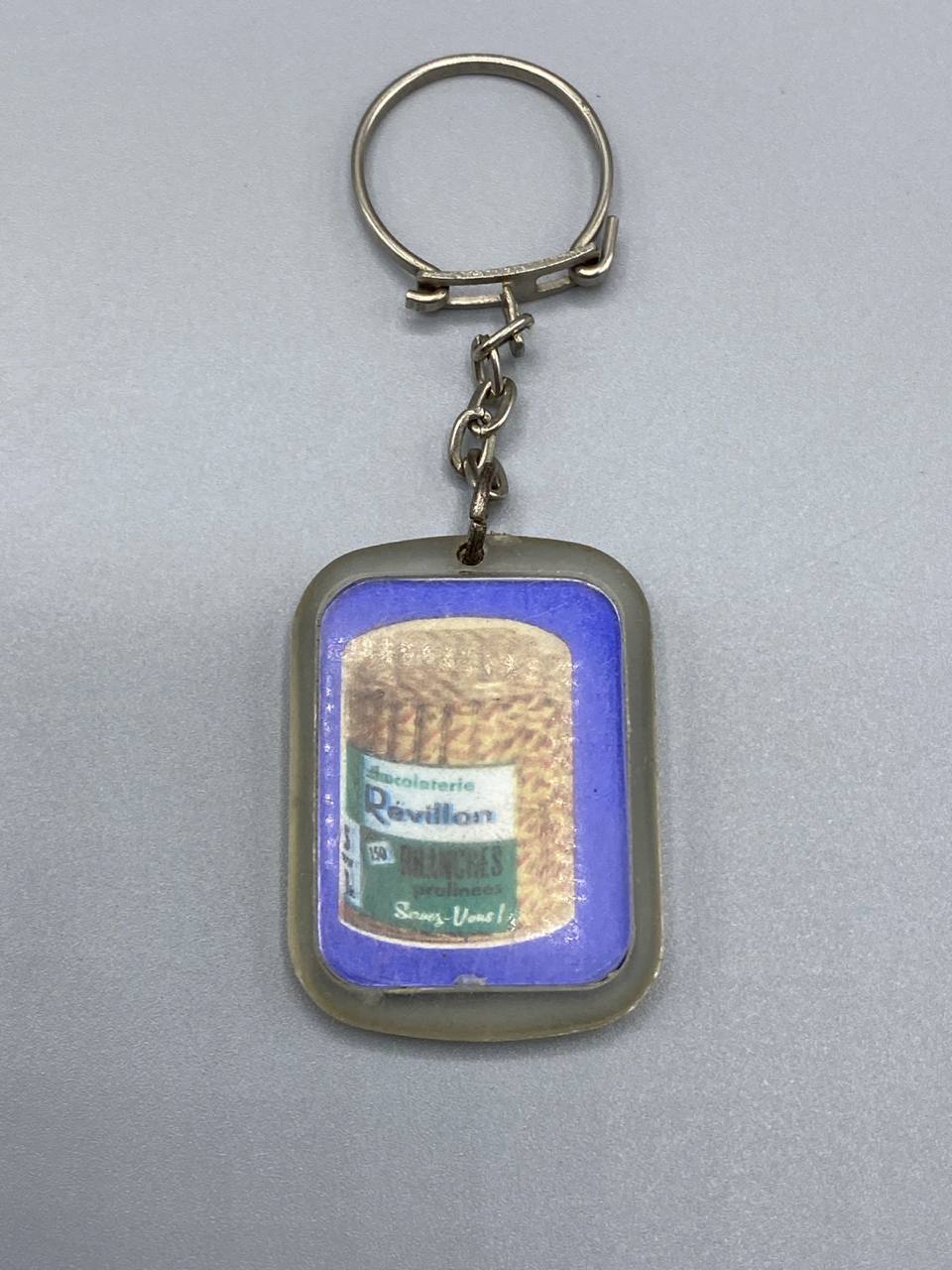 Porte-clés double face Révillon Chocolaterie – Blason de la Marche