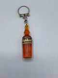 Porte-clés publicitaire Saint Raphaël – Bouteille miniature en résine