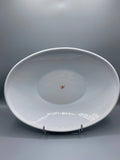Grand plat ovale Alessi en porcelaine blanche, diablotin rouge, design italien