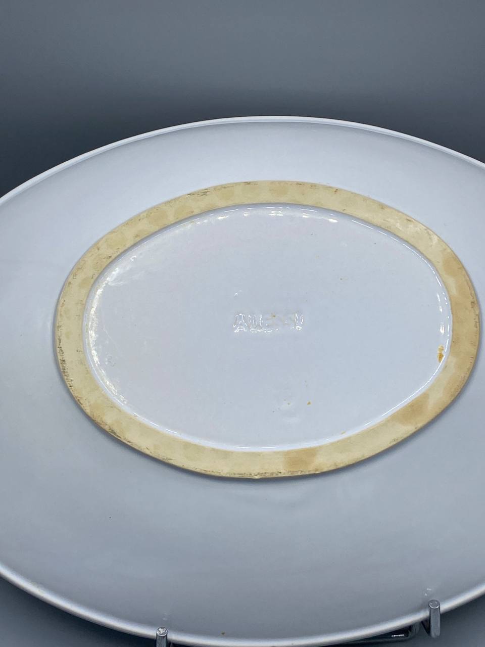 Grand plat ovale Alessi en porcelaine blanche, diablotin rouge, design italien