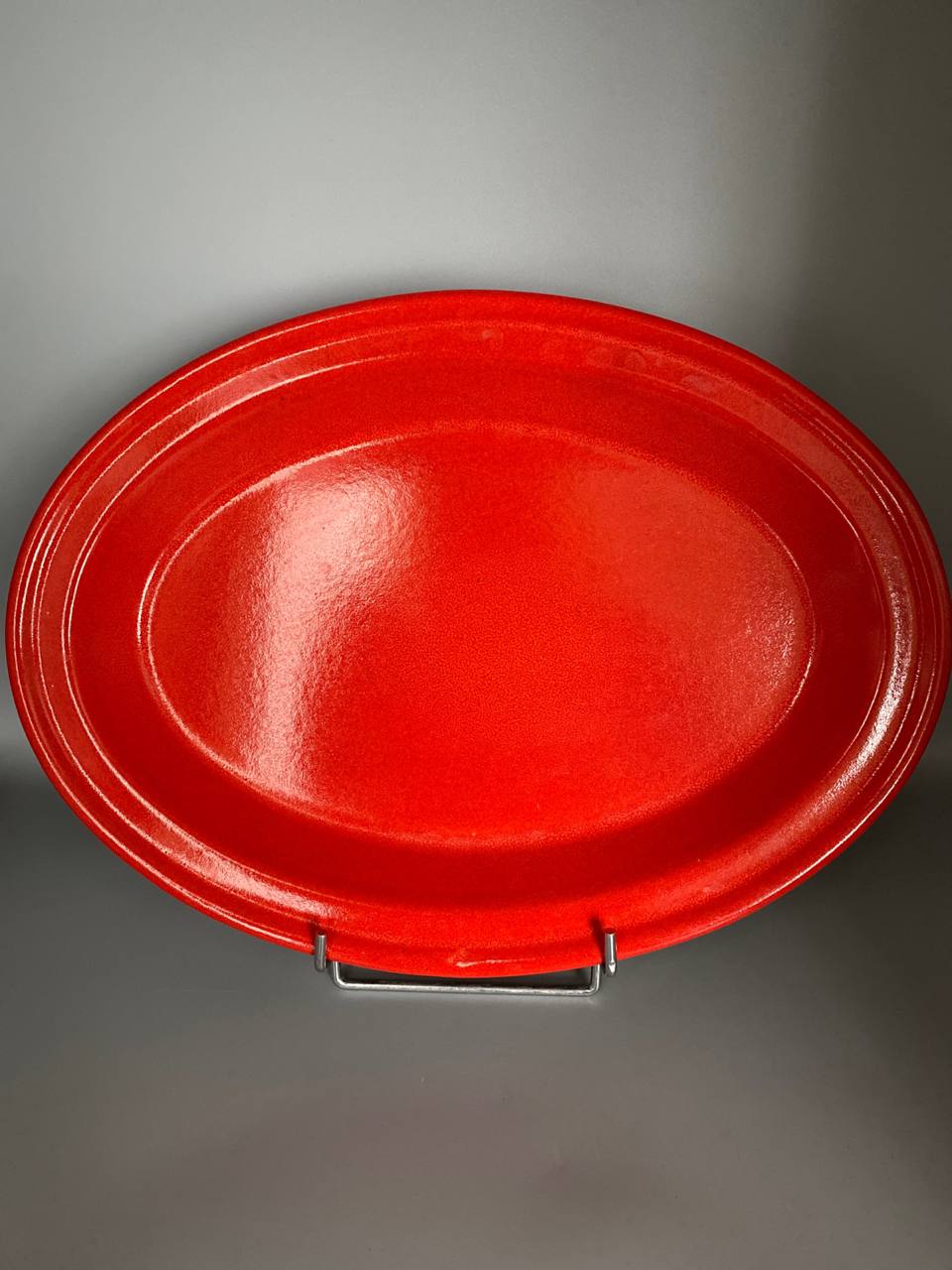 Grand plat ovale Emile Henry rouge vif, céramique française