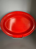 Grand plat ovale Emile Henry rouge vif, céramique française