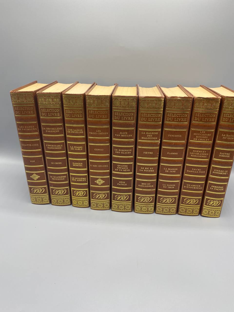 Sélection du Livre – Reader's Digest – Lot de 9 volumes – Reliures similicuir brun doré