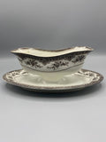 Saucière ancienne avec dormant faïence fine décor floral sépia vue de face