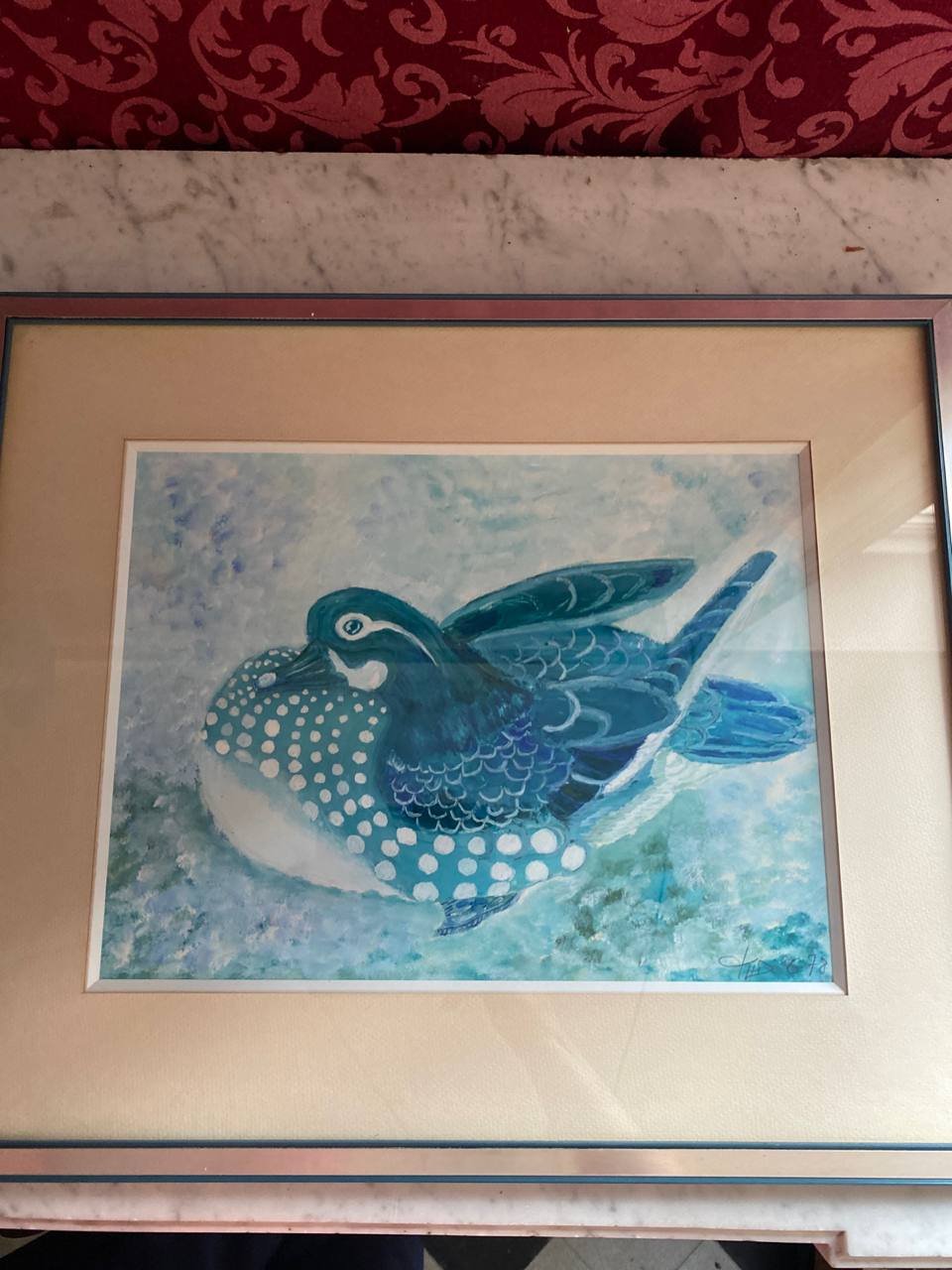 Aquarelle originale d'un huard stylisé sur les eaux dans des tons bleus et turquoise
