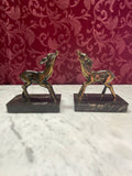 2 serre-livres faons régule bronzé sur socle marbre noir Art Déco