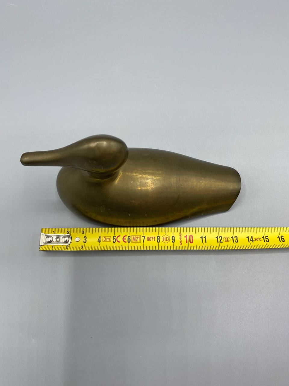 Canard laiton avec mètre ruban, longueur environ 15 cm