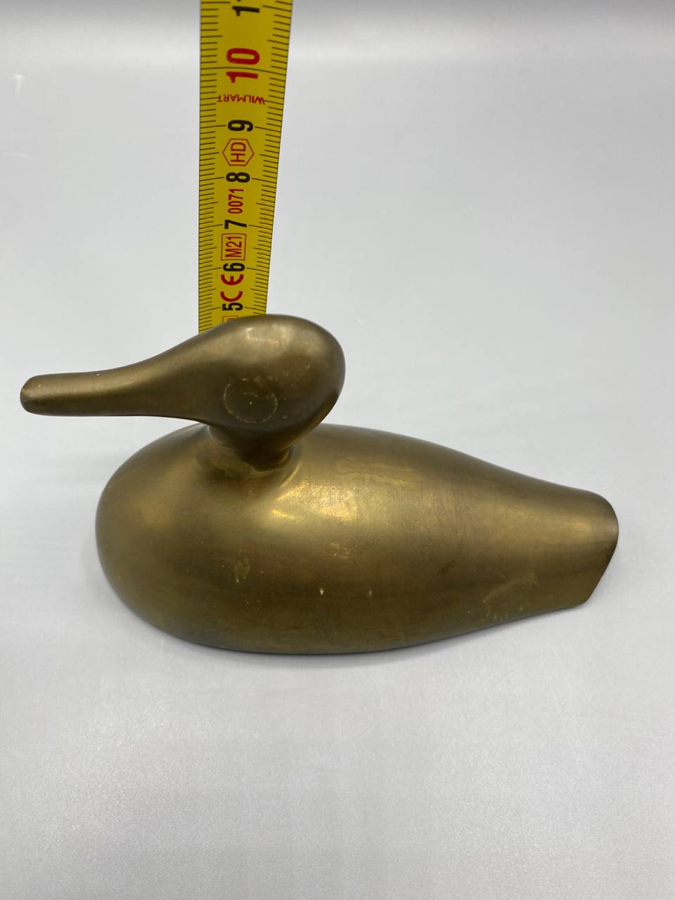 Canard laiton avec mètre ruban, hauteur environ 7 cm