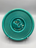Dessous de plat céramique émaillée turquoise canetons en relief sillons concentriques