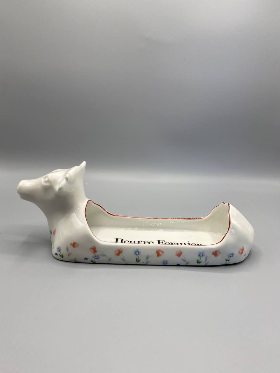 Beurrier vache Chauvigny – vue trois quarts arrière, inscription Beurre Fermier visible