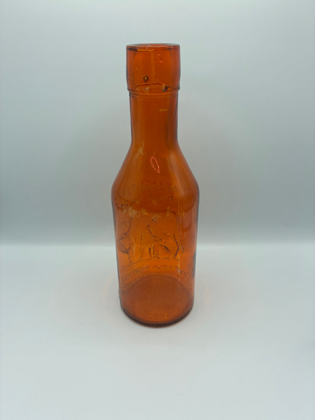 Ancienne bouteille à lait ambrée « Absolutely Pure Milk » – The Milk Protector – vers 1900