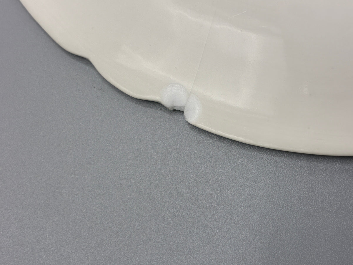 Mesure du diamètre d’environ 15 cm d’une sous-tasse