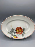 Plat ovale faience Sarreguemines Marechal Miel, vue de face decor rose rouge et jaune