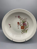 Grande jatte ancienne faience decor oeillets, vue de face bouquet floral