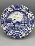 Assiette décorative Delft bleu, scène du semeur dans un paysage de polders, vue de face