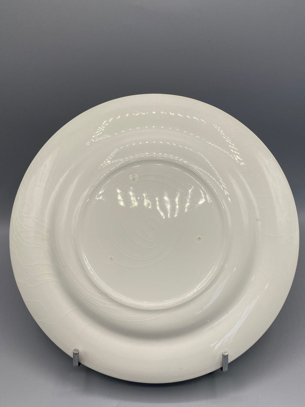 Revers de l'assiette Delft, glaçure blanche sans marque