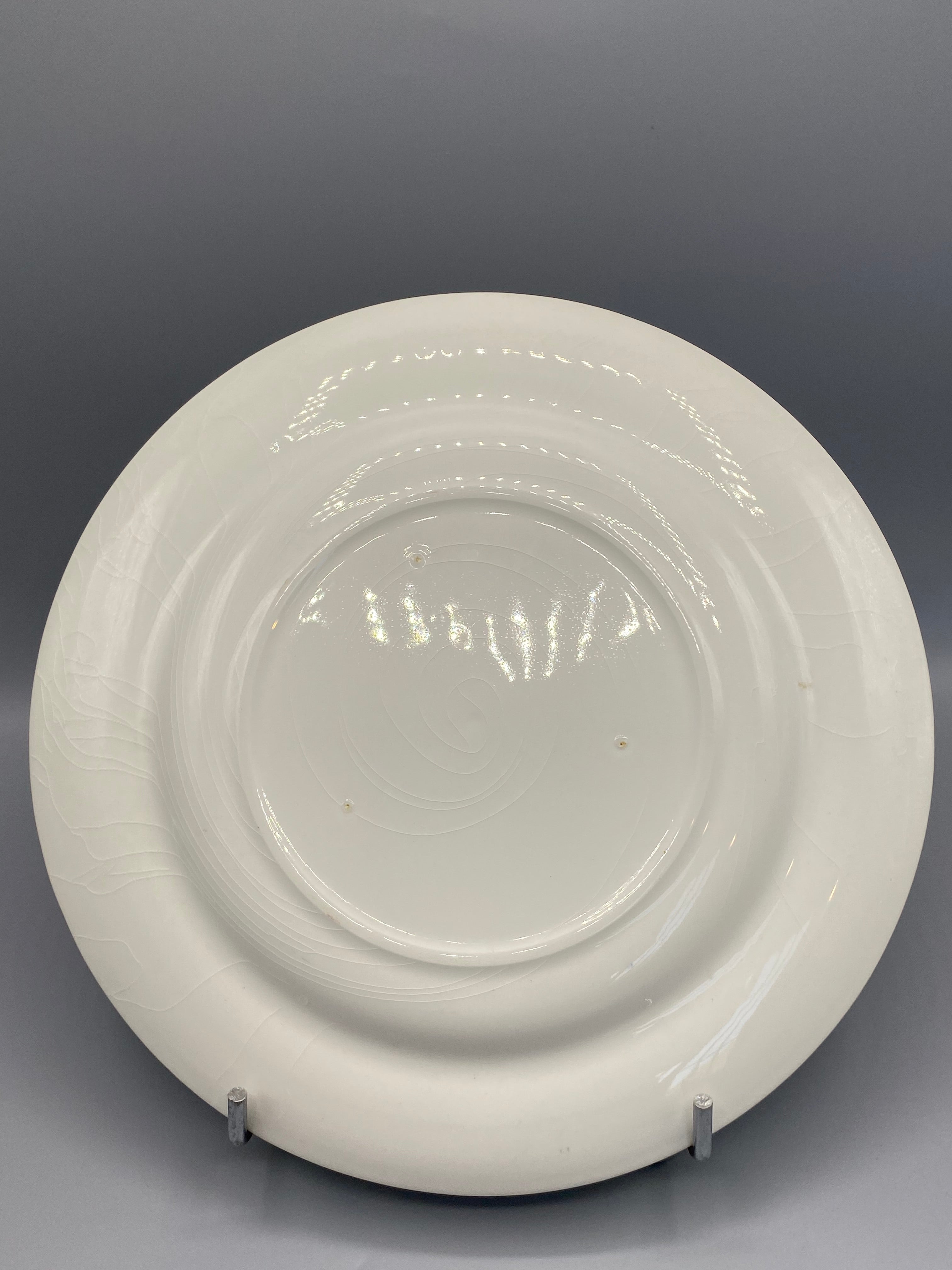 Revers de l'assiette Delft, glaçure blanche sans marque