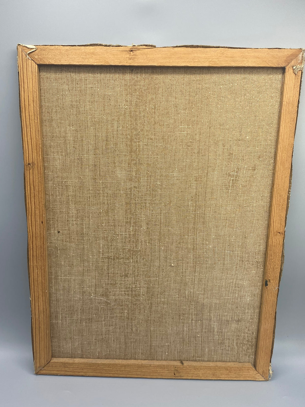 Revers de la toile sur châssis bois brut