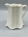 Crémier Haviland France porcelaine blanche godronnée, vue de face