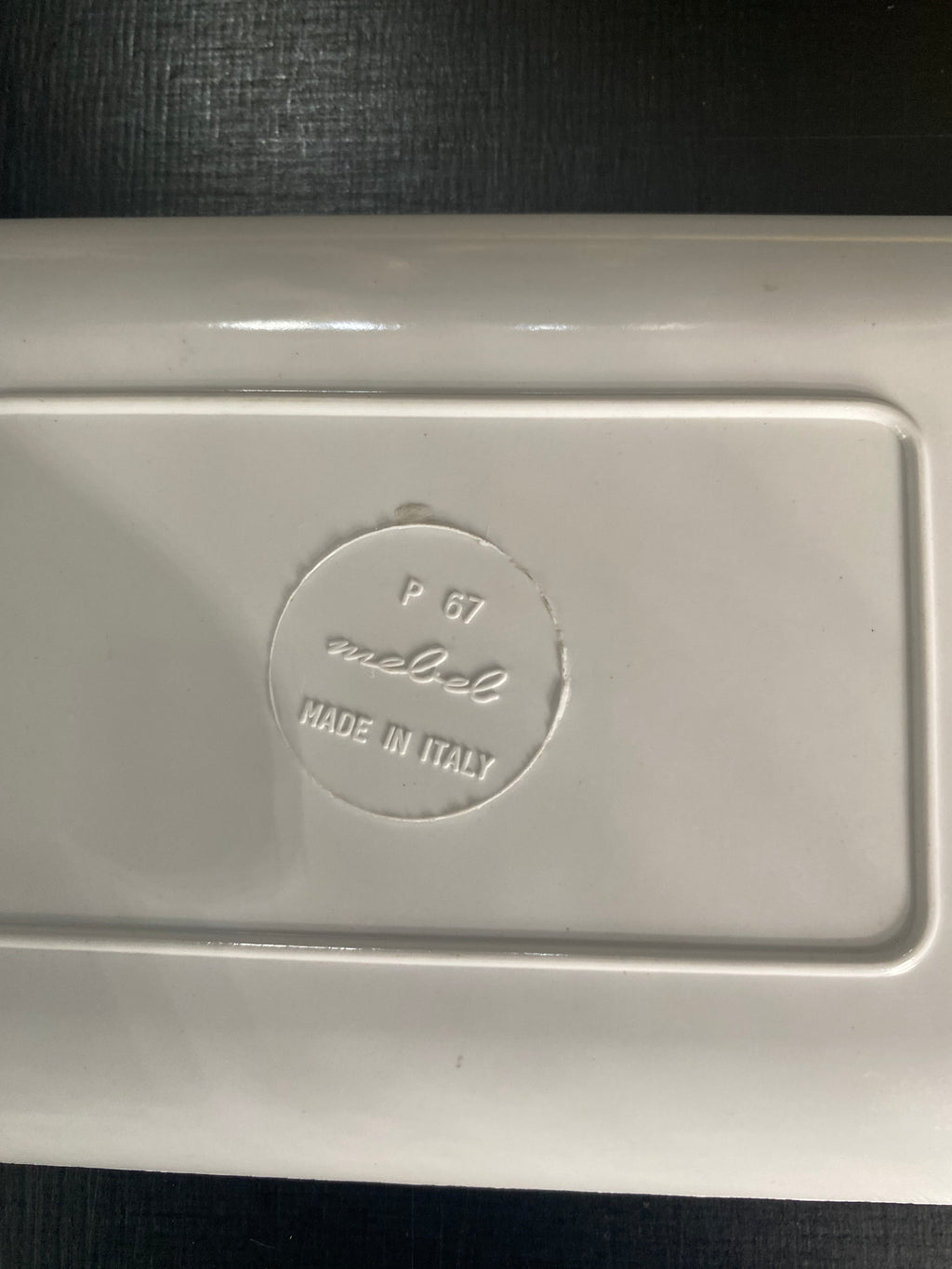 Tampon en relief au dos : Mebel, Made in Italy, P 67
