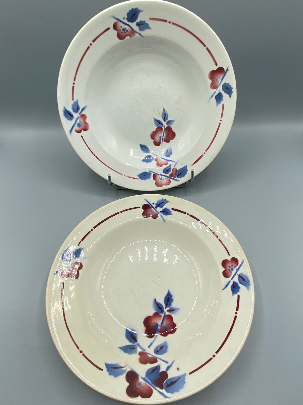 2 assiettes creuses Céranord modèle Niger – Décor floral bleu bordeaux – Art déco vers 1930