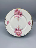 Assiette ancienne porcelaine Limoges, vue de face, bouquets de roses vieux rose et arabesques dorées