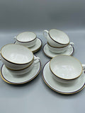 6 tasses à thé et 6 soucoupes en porcelaine de Limoges, cobalt et or