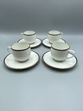 4 tasses à café et 4 soucoupes en porcelaine de Limoges, cobalt et or