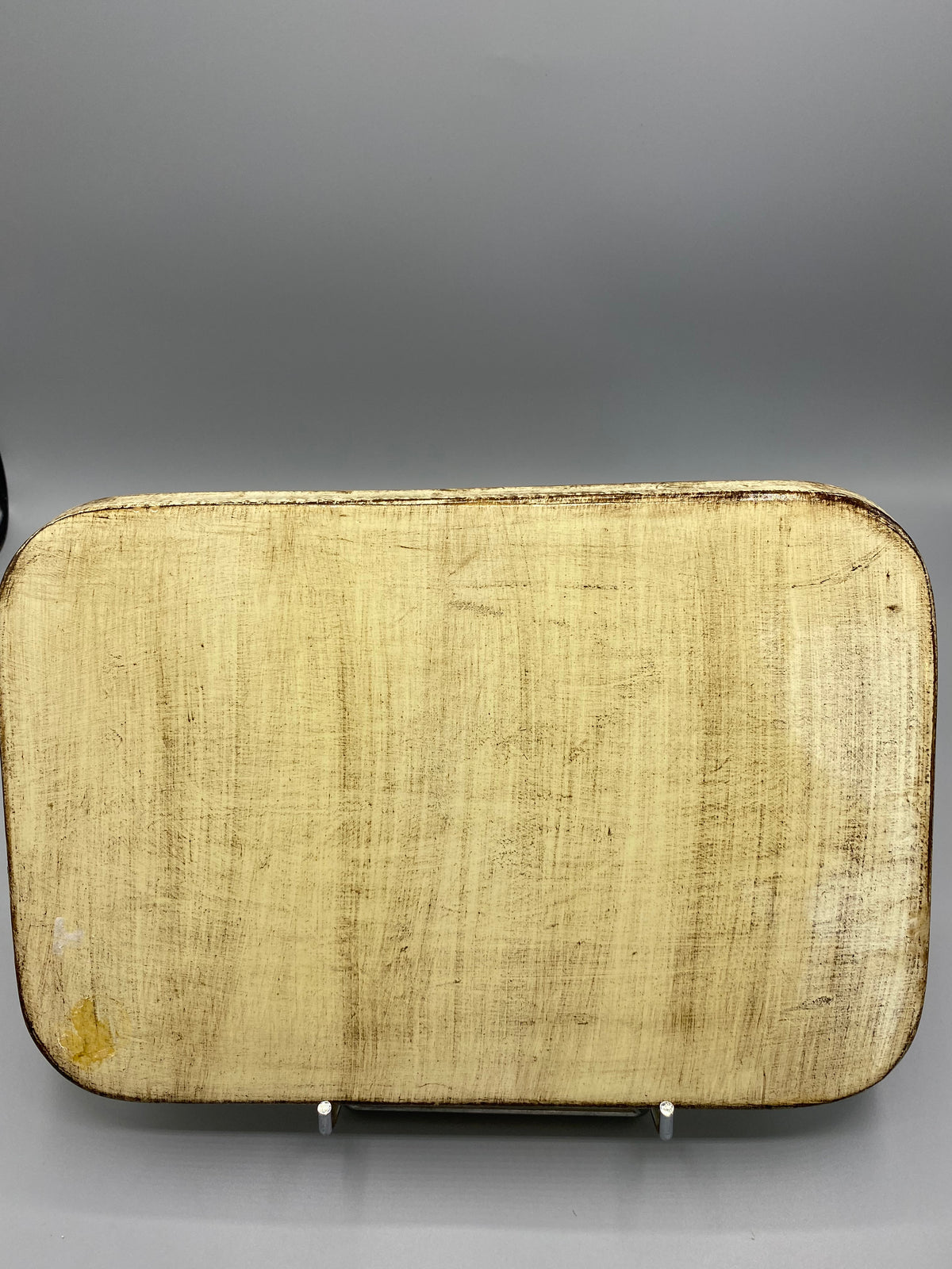 Revers du plateau en bois laqué
