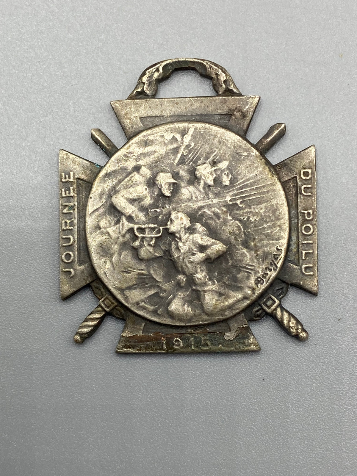 Avers de la médaille : Journée du Poilu 1915, scène de soldats à l'assaut, signée Bargas
