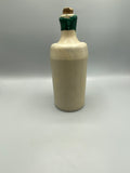 Ancienne bouteille allemande M.K.M. en grès crème avec col vert