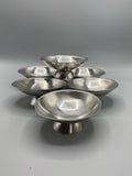 Ensemble de six coupes à glace Guy Degrenne en inox sur pied