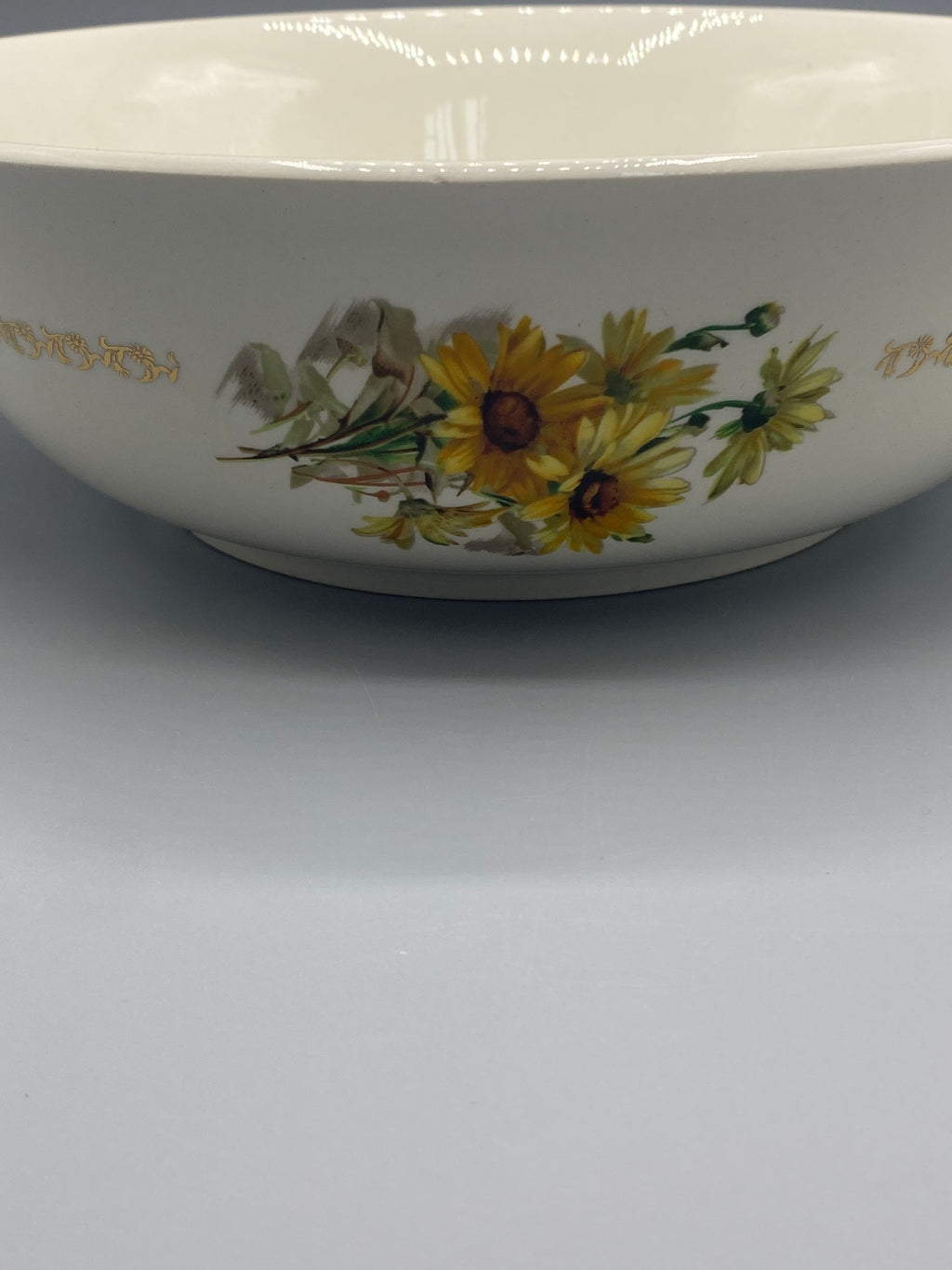 Diamètre du saladier Gien Marguerites mesuré au mètre ruban