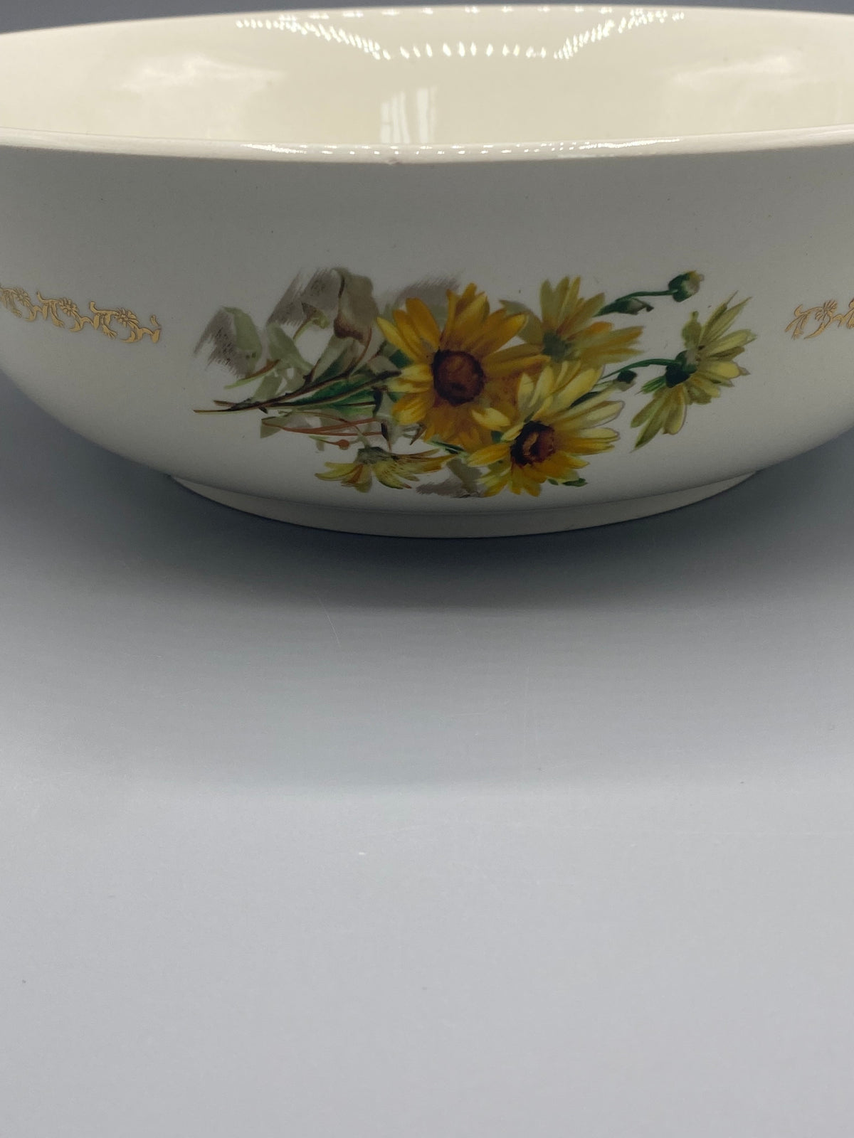 Diamètre du saladier Gien Marguerites mesuré au mètre ruban
