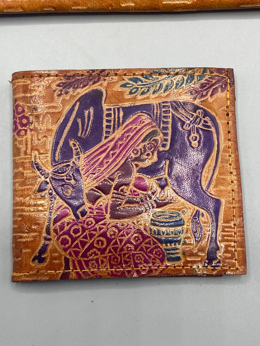 Mesure de la hauteur du portefeuille décoré