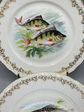 Ensemble de six assiettes à poisson en porcelaine française à bord doré