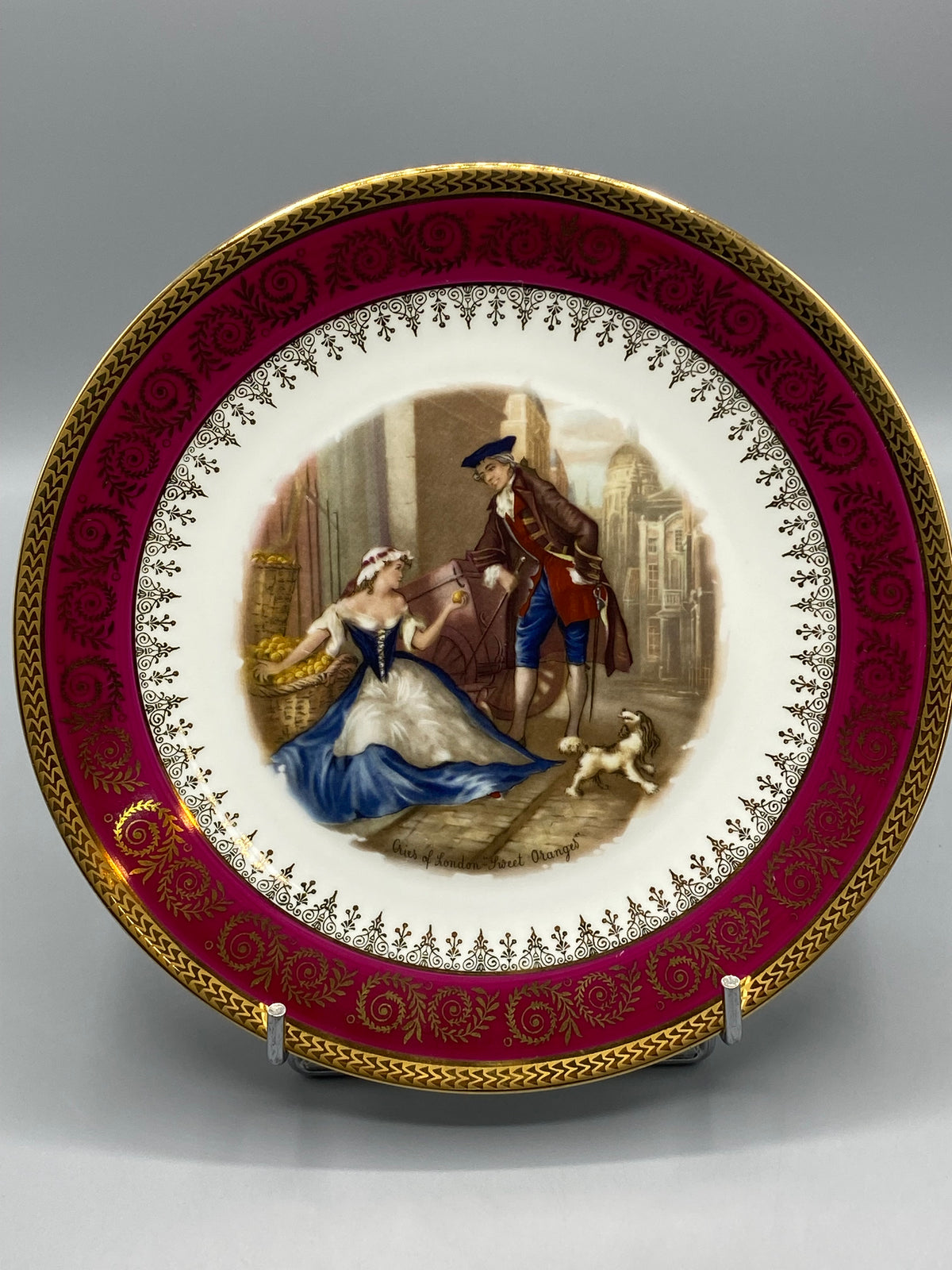 Assiette Limoges Cries of London Sweet Oranges à bordure framboise et dorures